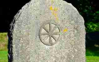 Wheel symbol carved into stone